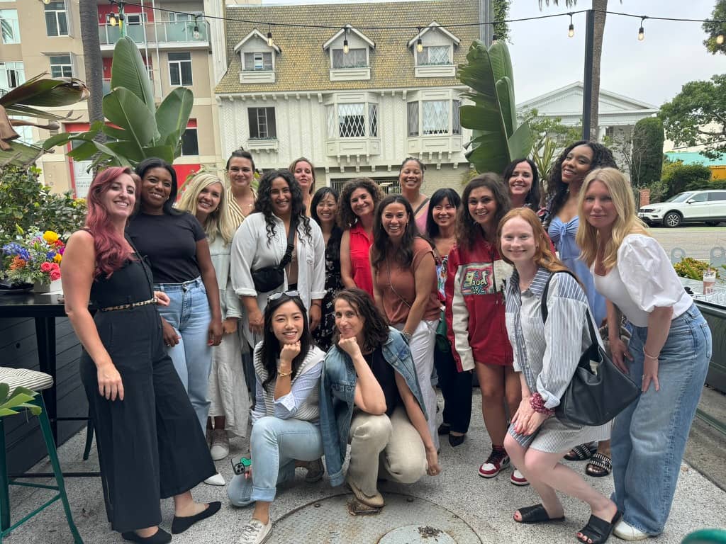 A group of professionals outside during a happy hour