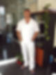 Man in white suit at Bodysoul Balance.
