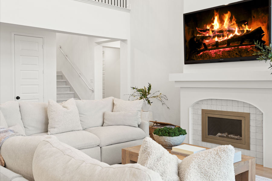 Family room with fireplace and built-ins: luxury home photography, Houston by Marz Media Photography