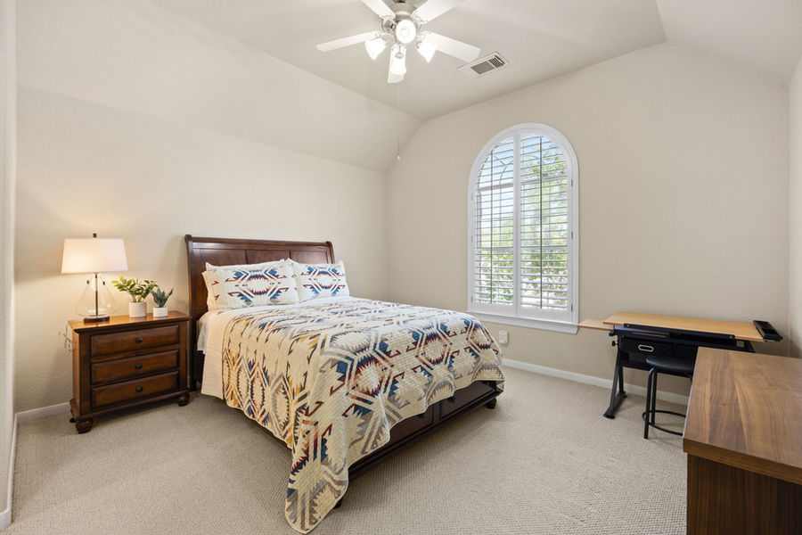 Bedroom with vaulted ceiling: HDR real estate photography for a Houston listing by Marz Media Photography