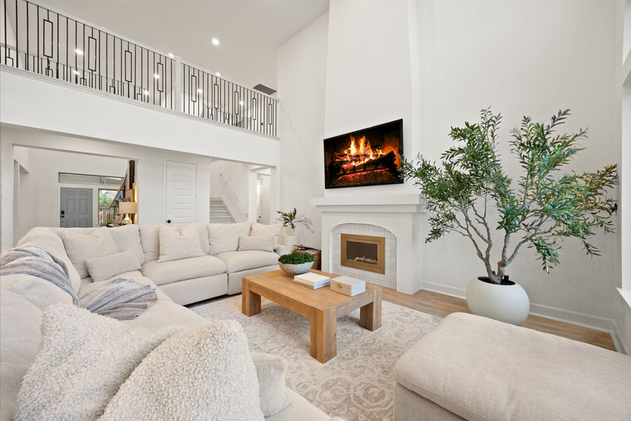 Bright living room with fireplace: architectural and real estate photography, Greater Houston by Marz Media Photography