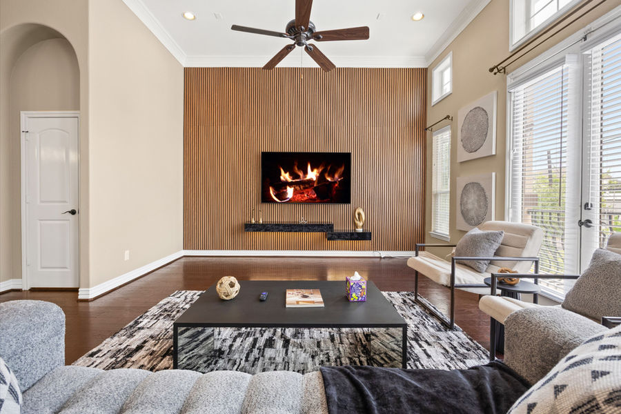Family room with fireplace: luxury real estate photography in Houston, TX by Marz Media Photography