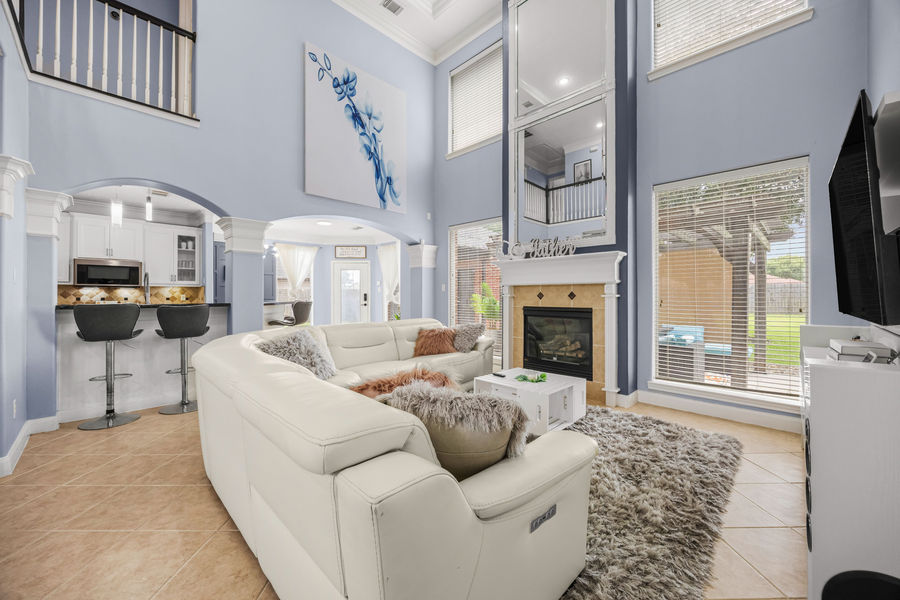 Open floor plan family room: luxury real estate photography in Houston, TX by Marz Media Photography