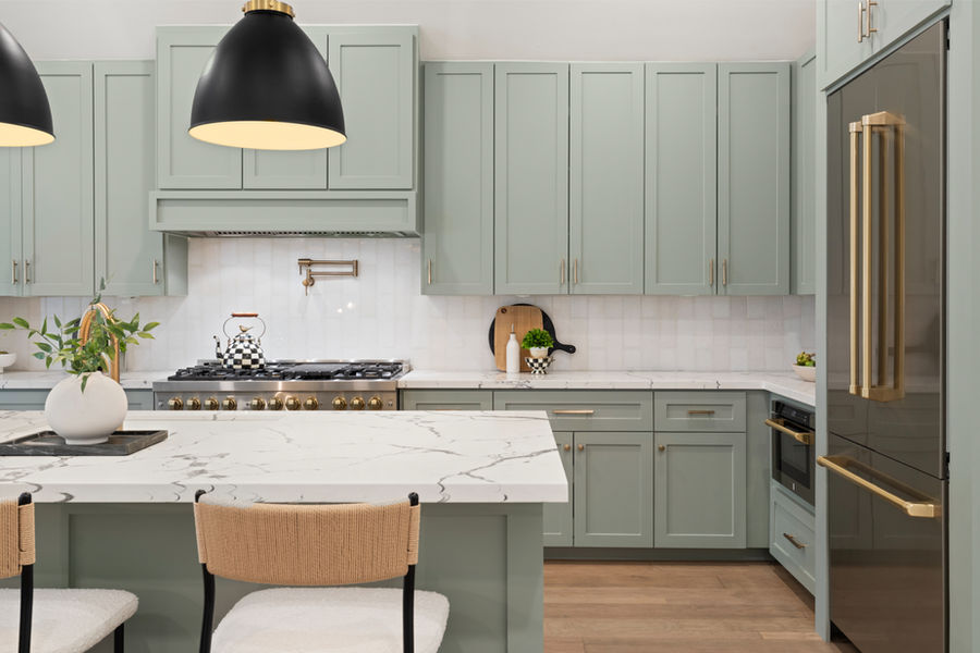 Kitchen with range hood and custom cabinets: HDR real estate photography for a Houston listing by Marz Media Photography