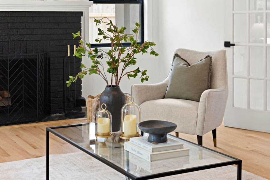 Styled sitting room with console table: HDR real estate photography for a Houston listing by Marz Media Photography