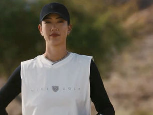 Michelle Wie West with the McLaren Golf papaya bag