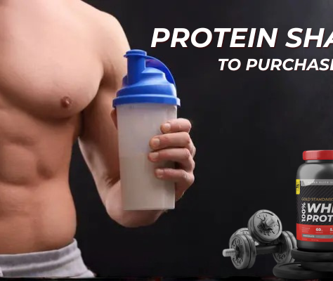 Muscular man holding a protein shaker bottle with whey protein container and dumbbells beside him, promoting protein shakes to purchase for muscle growth and fitness.