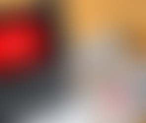 Laptop displaying YouTube logo with notebook guide showing steps to start a YouTube channel for beginners.