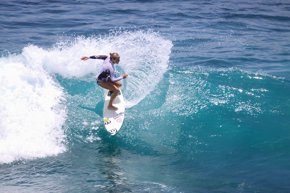 Surfboards and surfers preparing for a session at a beach in South Lombok