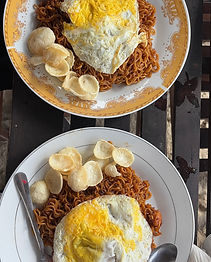 Traditional Indonesian fried noodles served at a beachfront café in Selong Belanak