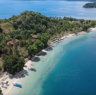 Aerial view of Gili Asahan beach and jungle - which gili island is best for eco retreats and quiet island escapes