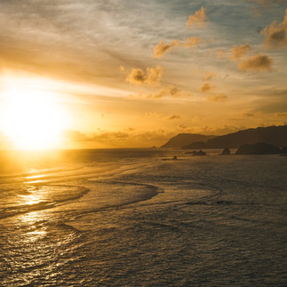 Golden sunset over the ocean at Bukit Merese, South Lombok