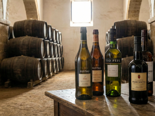 Sherry bottles on a table in a cantina