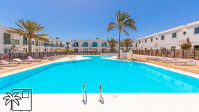 Modern swimming pool in a residential complex in Corralejo, Fuerteventura.