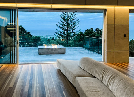 Kelly Martin Architecture_white house living to firepit.JPEG