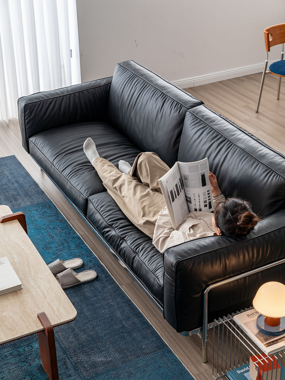 Thumbnail: Klaus Black Leather & Chrome Sofa – styled in modern open‑plan living room