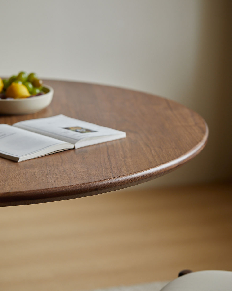 Thumbnail: Lund Round Table – smooth rounded edge detail and warm black walnut grain