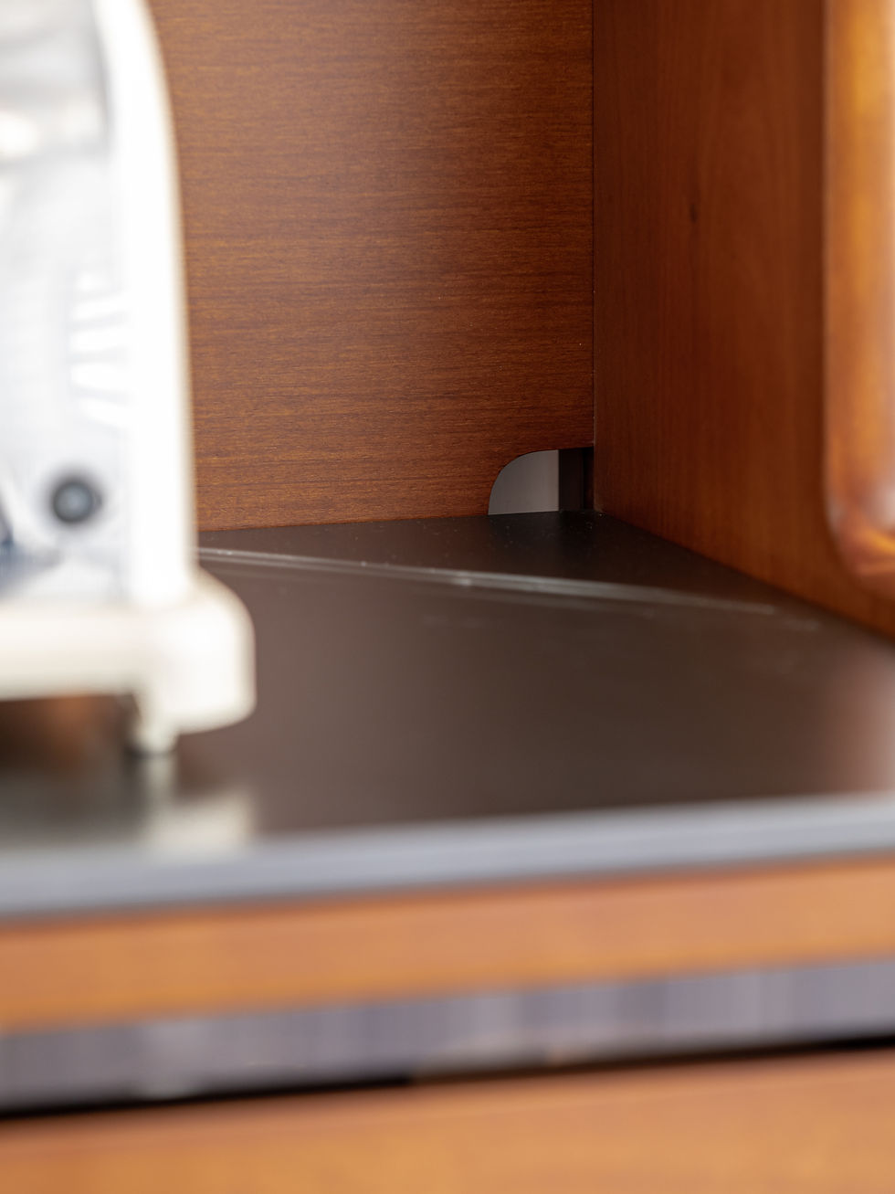 Thumbnail: Nara Hutch Sideboard Coffee Station Blue – close up of black sintered stone worktop surface and solid wood edge