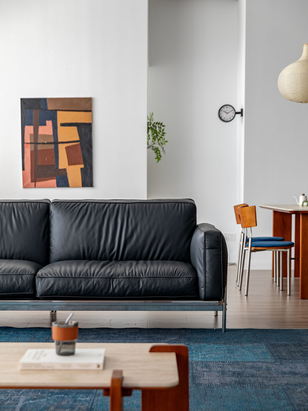 Thumbnail: Klaus Black Leather & Chrome Sofa – styled view in bright living space