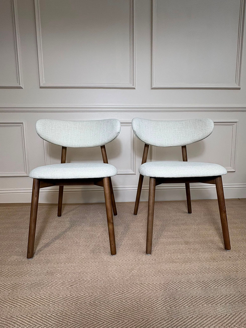 Thumbnail: Nene dining chairs in ivory weave