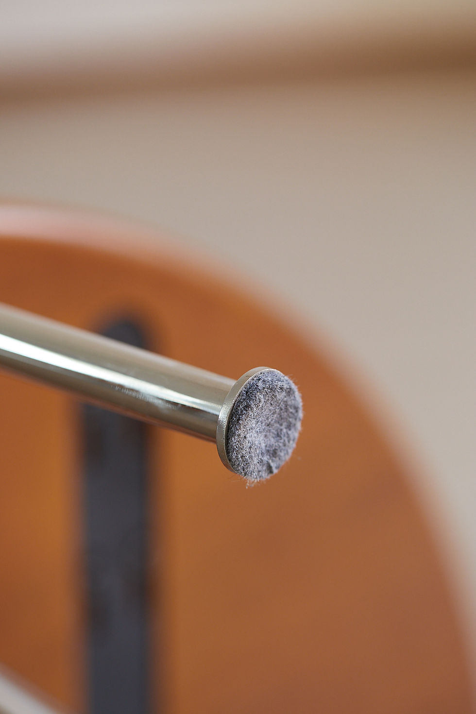Thumbnail: Leg/foot detail Close-up of the metal leg tip on the Orbit corner display shelf