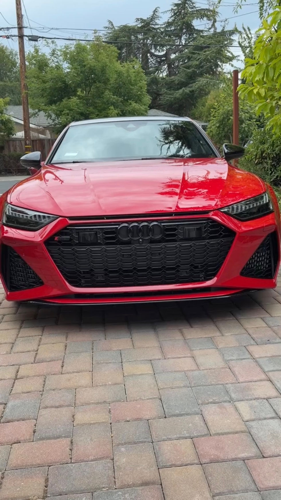 Shiny red Audi after premium detailing session