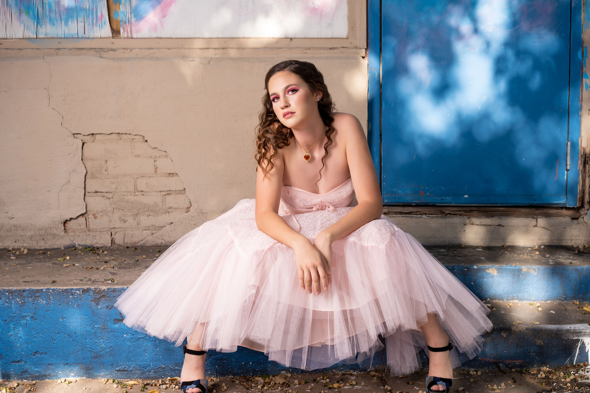 Senior girl in light pink strapless prom dress