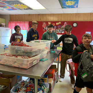 Kids Feeding Kids Witness the heartwarming act of Kidzz Helping Kidzz as they pack backpacks with food for their food insecure peers