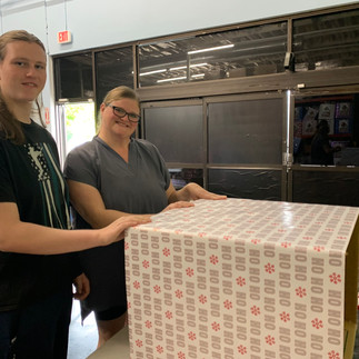 Kidzz Helping Kidzz warehouse bustles with activity as kids prepare for their annual toy drive