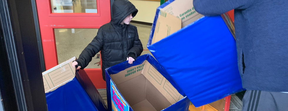 Kids and adults collaborating to support the kidzz helping kidzz food drive.