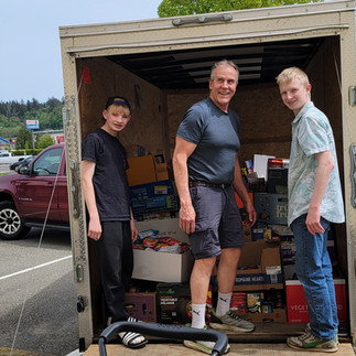 food drive sorting party trailer loading transport logistics haul