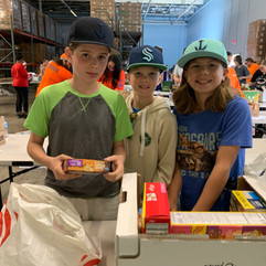 food drive sorting party local outreach nutrition support giving back