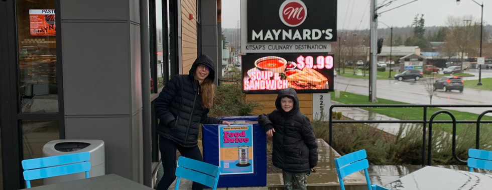 Person making a monetary donation to support the kidzz helping kidzz food drive.