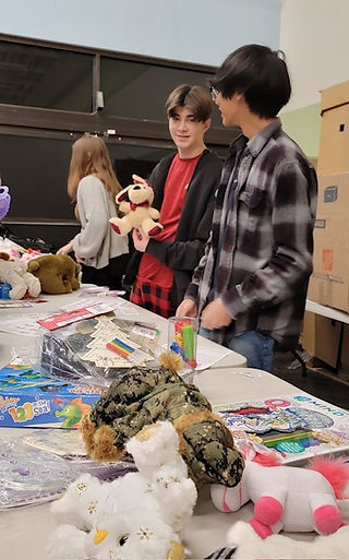 donate christmas gifts kidzz helping kidzz toy sorting party 12-2023