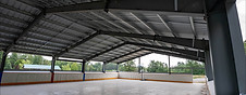 Pre-engineered steel ice arena with clear-span construction for hockey, skating, and recreational sports facilities.