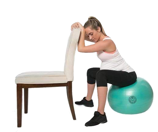 laboring mom sitting on birth ball to manage labor pain