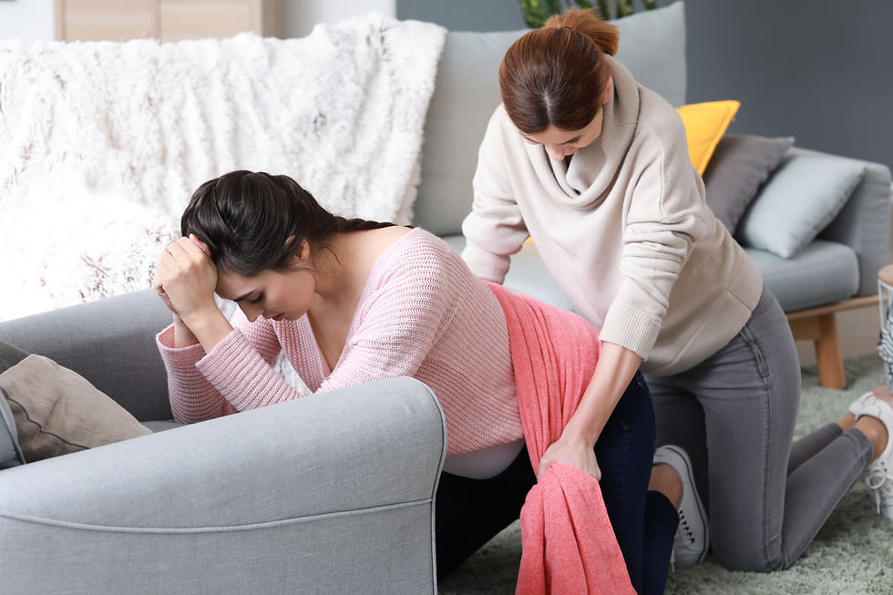 doula assisting laboring mom with rebozo for labor pain management