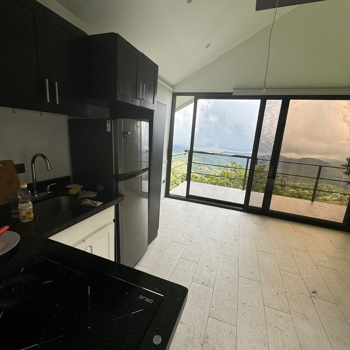 Cold and dark entryway with no decorative intention or lighting design