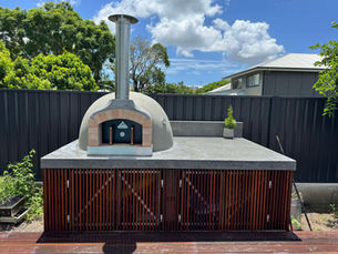 The Fire Brick Co D95 brick pizza oven installed on existing base with stainless steel wrap in Brisbane, built by Brisbane Pizza Ovens.
