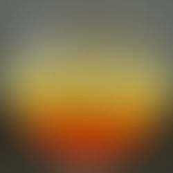 Foto de la bebida, que tiene arriba un color amarillo, y pasa con un degradado a un color coral
