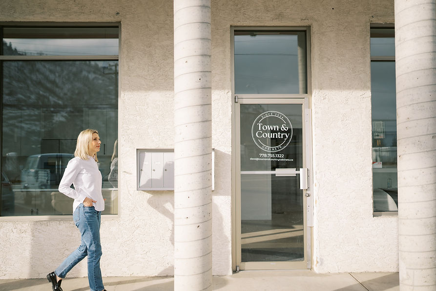 Woman walking outside store.jpg