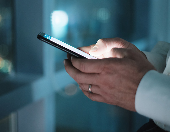 hands-of-business-man-typing-text-messag