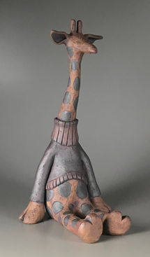 Sitting Giraffe         15 inches H            All Dressed Up