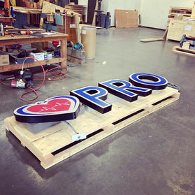 Crating in fragile signworks in Vancouver