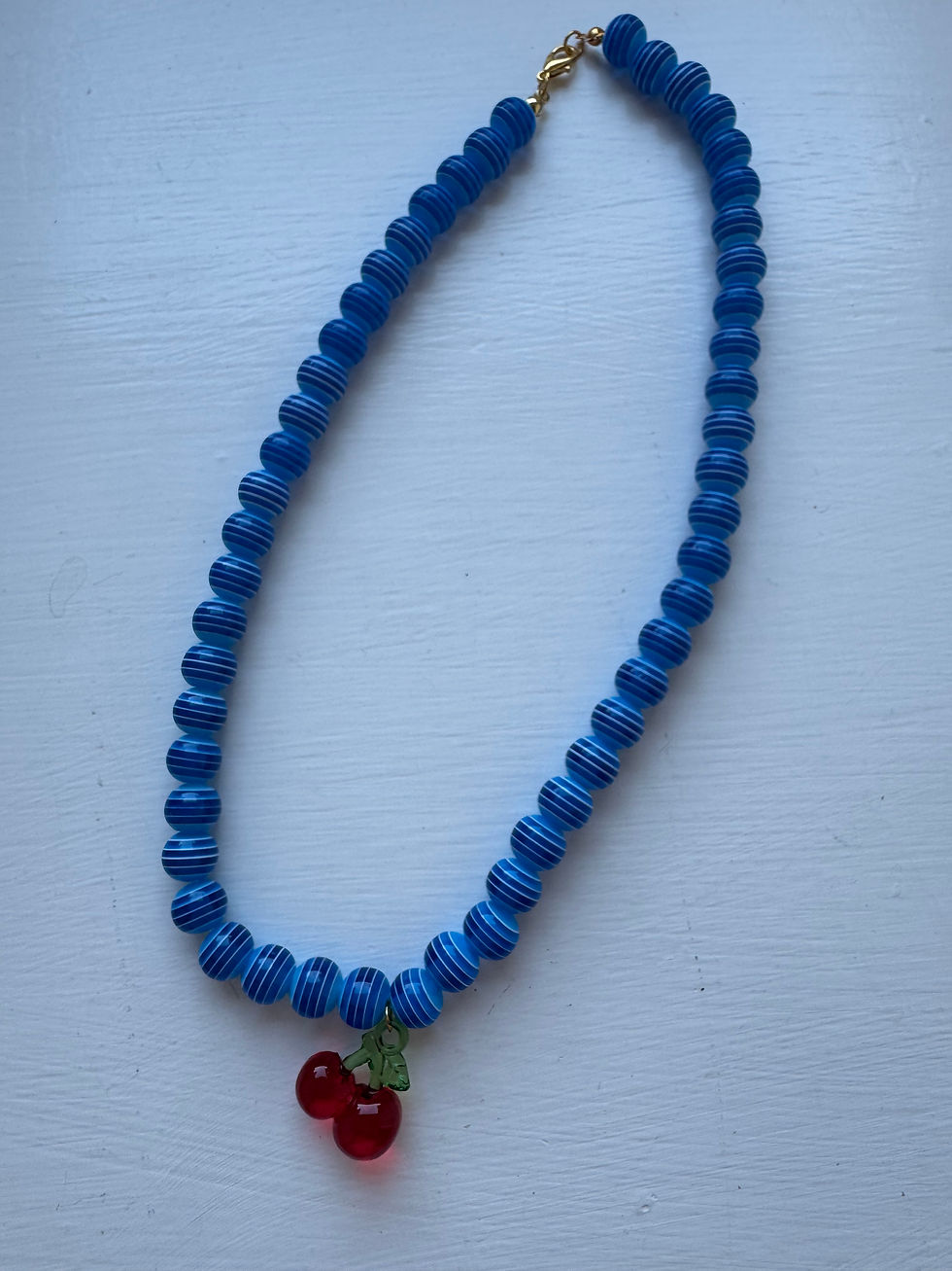 Thumbnail: Chunky blue cherry necklace 