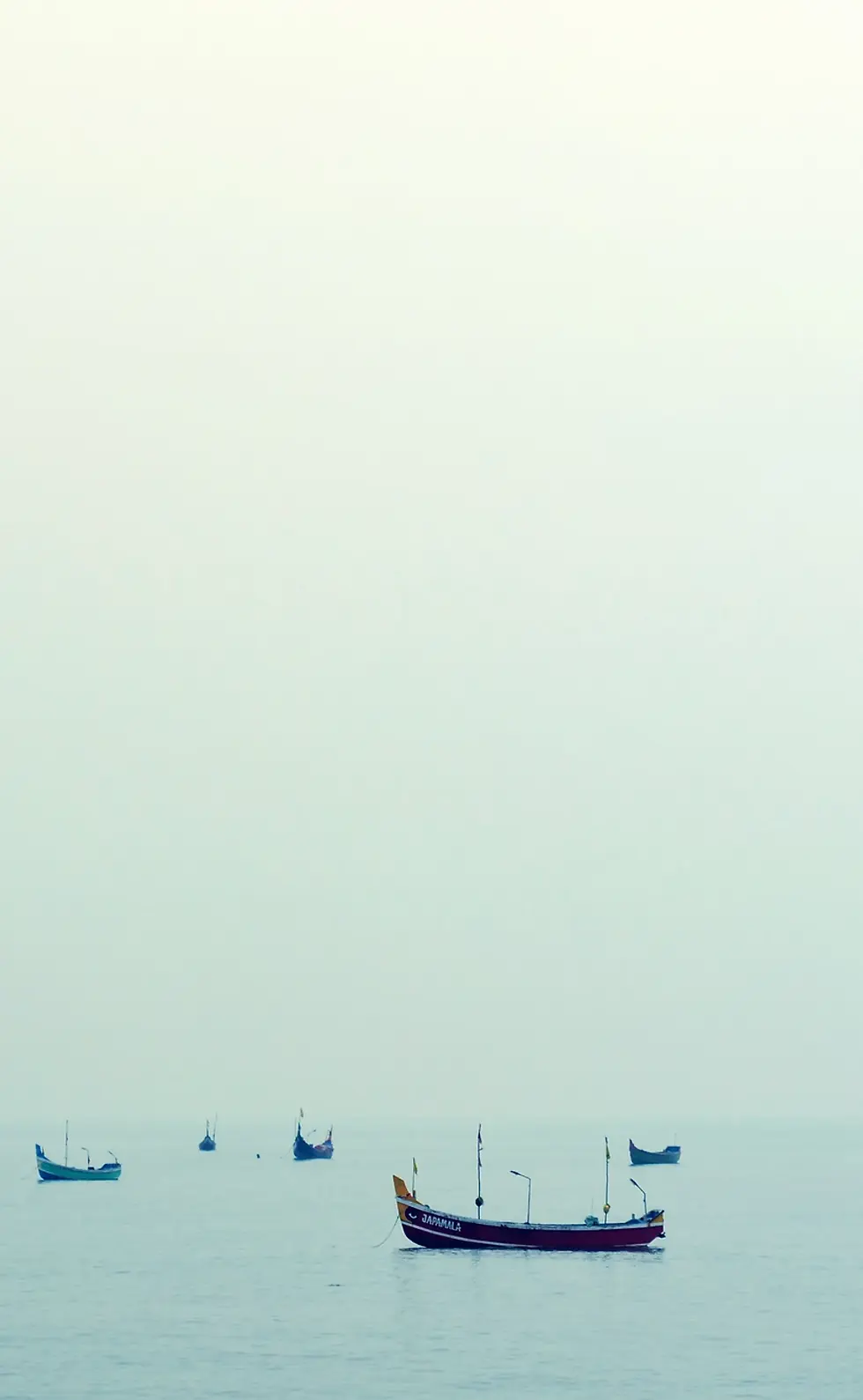 background brcostal traditional boats.webp