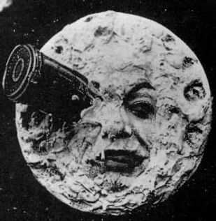 Scene-of-movie-the-trip-to-the-moon-a-space-rocket-inside-an-eye-in-a-moon-face