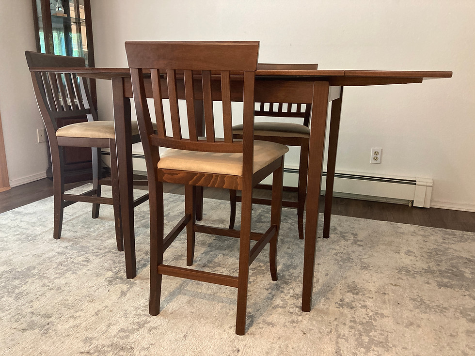 Thumbnail: Tall wooden dining table with three stools