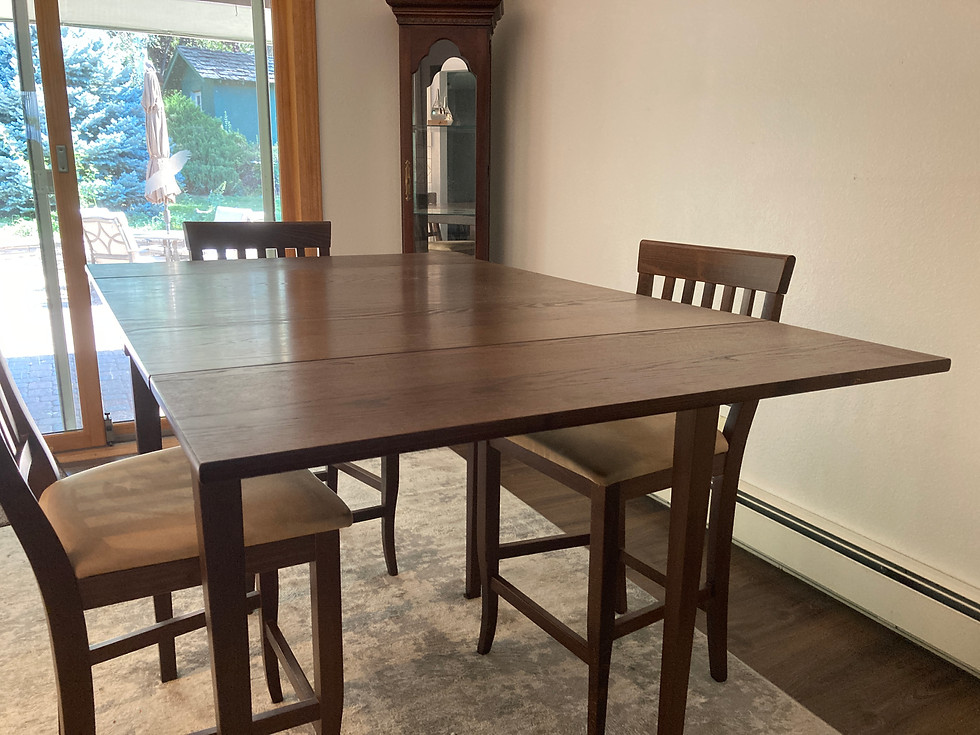 Thumbnail: Tall wooden dining table with three stools