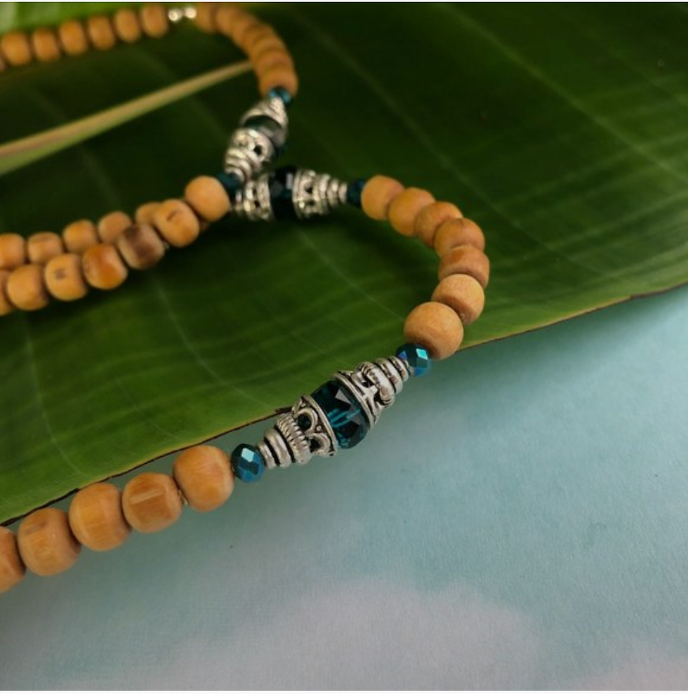 Thumbnail: 23 1/2" natural Tulasi with Om pendant and dark teal blue beads